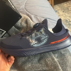 Brand new,never worn. Auburn team issued shoes.